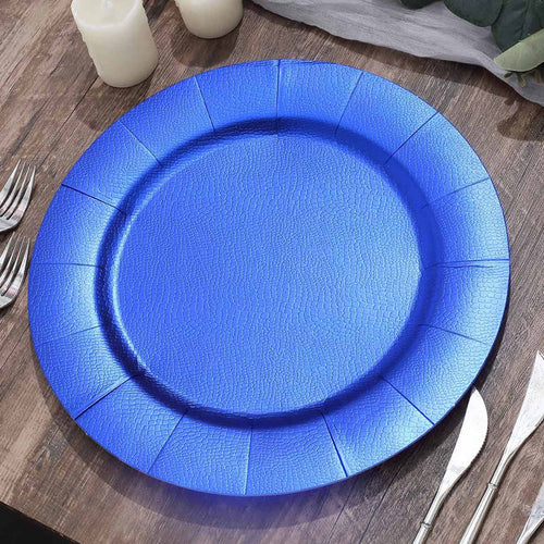 Blue textured charger plate on rustic wooden table.