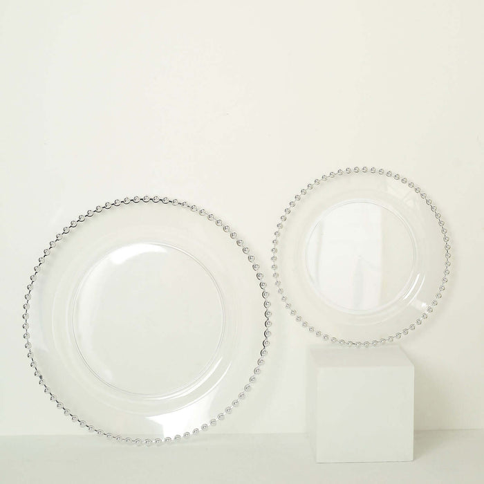Clear decorative plates with beaded edges on a white background.