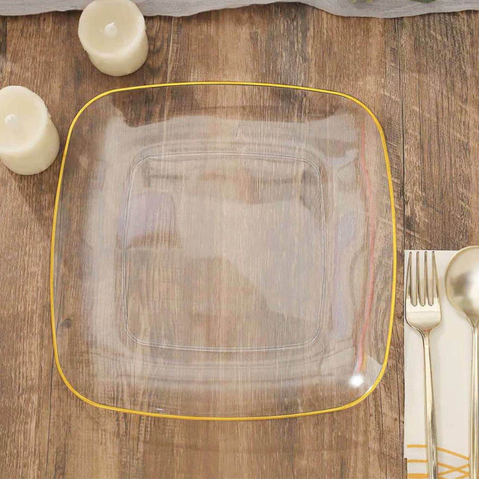 Clear square plate with yellow rim on wooden table.