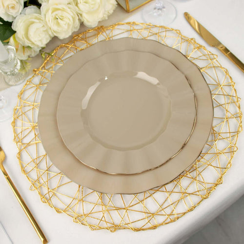 Elegant beige dinner plate set on a decorative gold charger with floral backdrop.