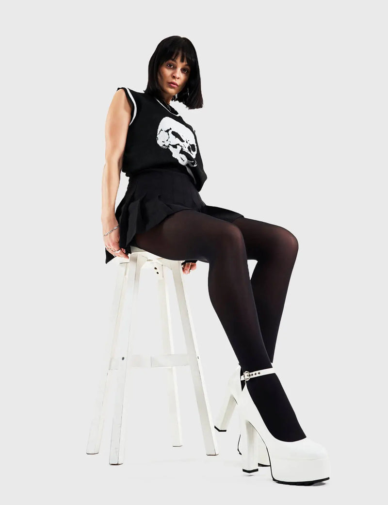 Head over Heels for these!
  
  Above Average Platform Heels in White faux leather. These platform heels feature a minimalist design with a thin ankle strap and silver buckle, perfect heels to compliment any outfit. Made with eco-friendly materials and 100% cruelty-free, these platform boots are as ethical as they are trendy.
  
  - Platform Height
  - Heel Height
  - Think ankle strap with a silver buckle and eyelets
  - High Heel
  - Platform sole
  - 100% vegan 
  
  SKU: LMF 3100 - WhitePU