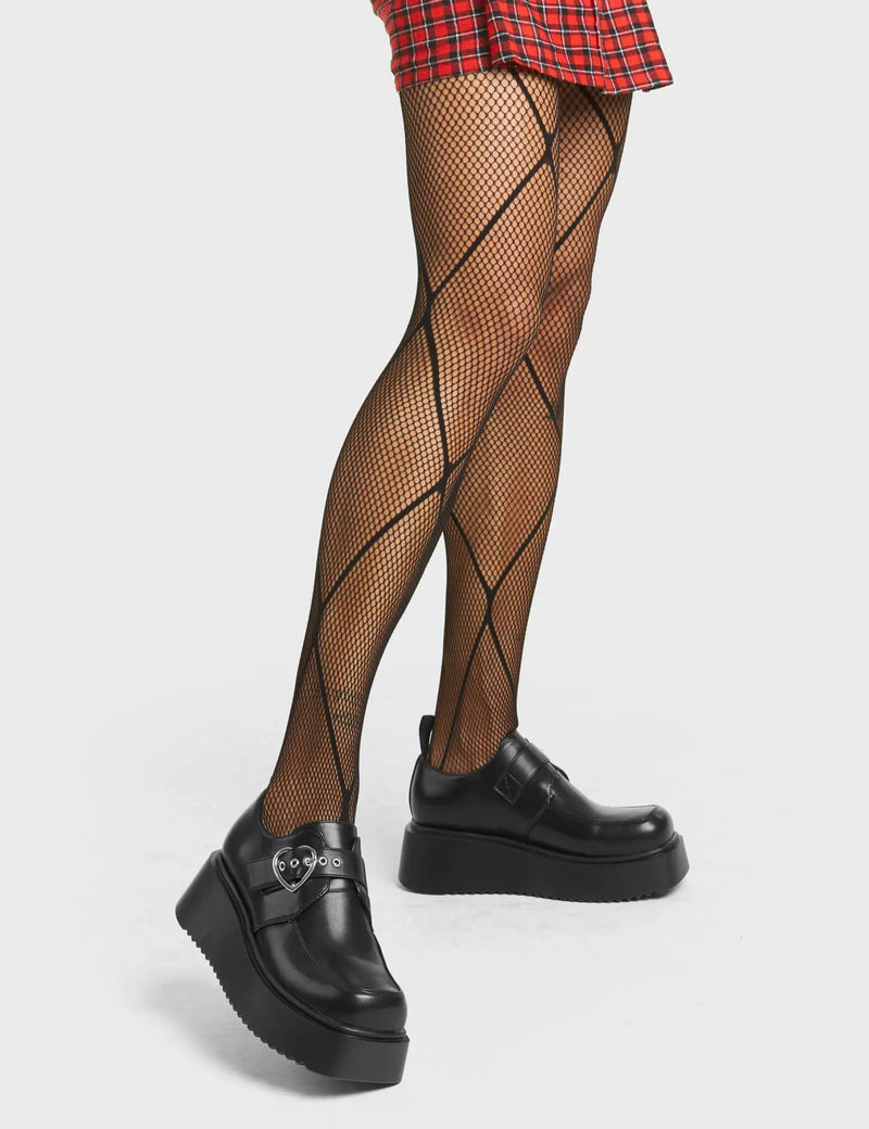 RAVING ALL NIGHT
  
  After Party Chunky Platform Shoes in Black Patent faux leather. These black shoes feature an adjustable black strap with silver eyelets and a silver heart shaped buckle. Made with eco-friendly materials and 100% cruelty-free, these platform boots are as ethical as they are lovely!
  
  - Platform Height
  - Adjustable Strap
  - Heart shaped buckle
  - Chunky Platform sole
  - Silver Eyelets
  - Round Toe
  - 100% vegan
  
  SKU: LMF 4012 - BlackPU