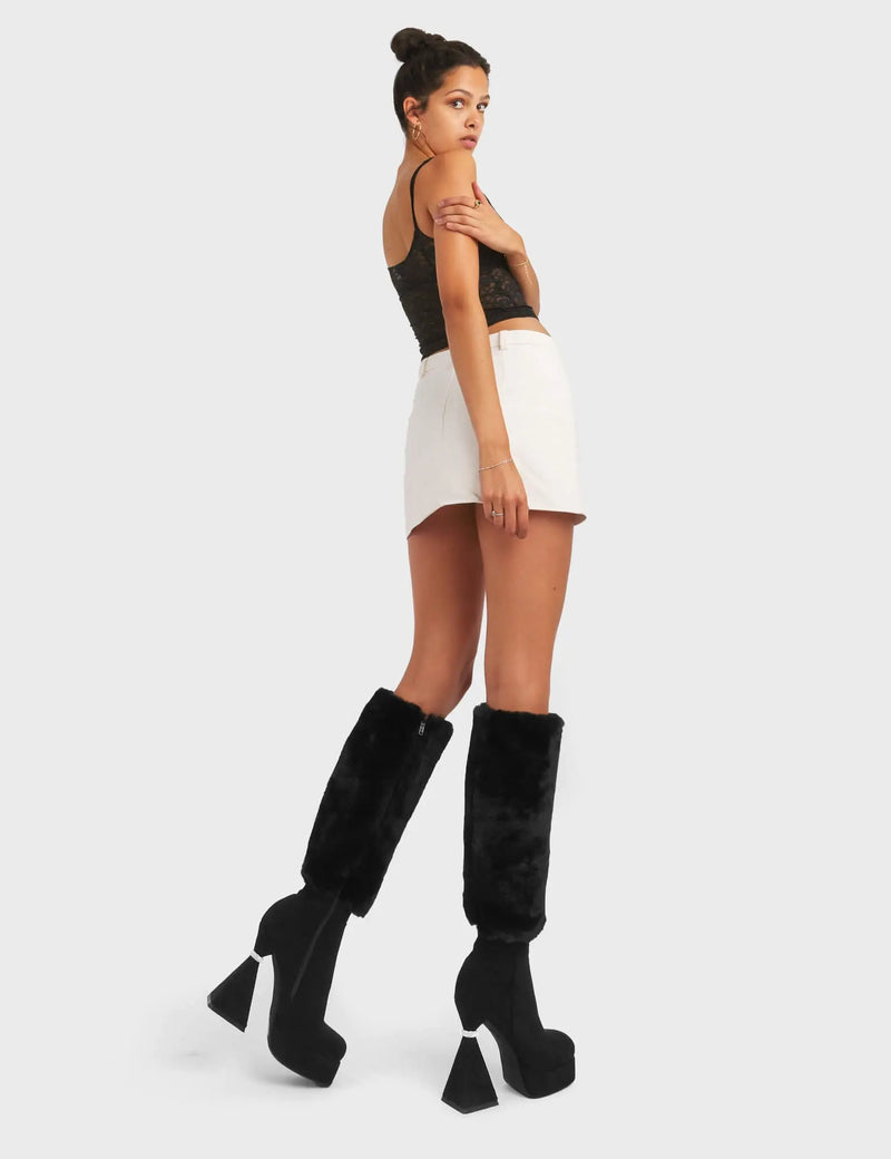 ASPIRATIONAL
  
  Ambitious Platform Knee High Boots in Black faux suede leather. These platform boots feature a flared heel that includes silver ring detailing on the heel.. Also features exuberant fur detailing across the upper, keeping it nice and classy. Made with eco-friendly materials, these platform boots are as ethical as they are chic.
  
  - Platform Height
  - Knee High Length
  - Fur Detailing
  - Flared Heel
  - Silver Ring Detail
  - Suede
  - 100% vegan
  
  SKU: LMF 5440 - BlackSUEDE/Fur