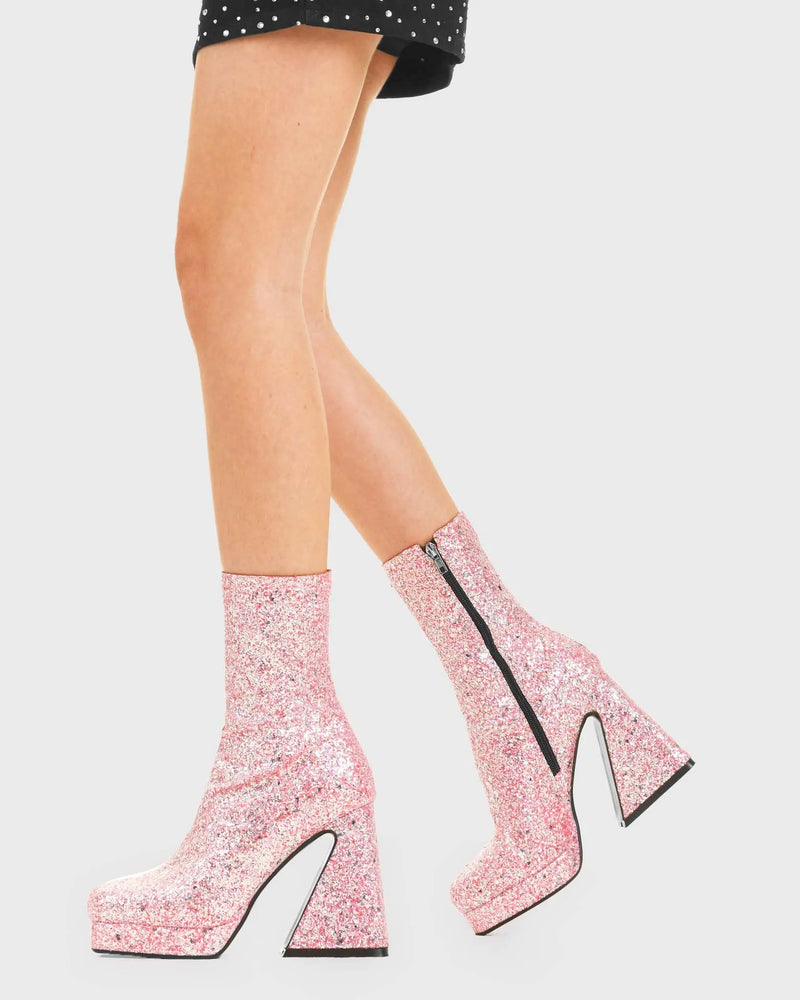 SPARKLE UP YOUR LOOK 
  
  Another Love Platform Ankle Boots in Pink Glitter. These vegan western Boots feature sparkling pink glitter with a flared heel. Made with eco-friendly materials and 100% cruelty-free, these boots are as ethical as they are Eye-Catching!
  
  
  - Platformed Heel
  - Calf length
  - Pink glitter
  - 100% vegan 
  
  SKU:LMF 3822 - PinkGlitter