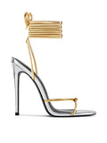 Femme LA Athens Lace Up in Gold/Silver – side profile showing silver metallic body with gold multi-strand lace-up ankle cuff, gold toe strap with knot, and slim stiletto heel