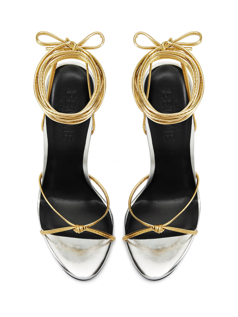 Femme LA Athens Lace Up in Gold/Silver – top-down view of the pair showing gold ankle cuffs with bow ties, crossed gold toe straps, and silver metallic toe area