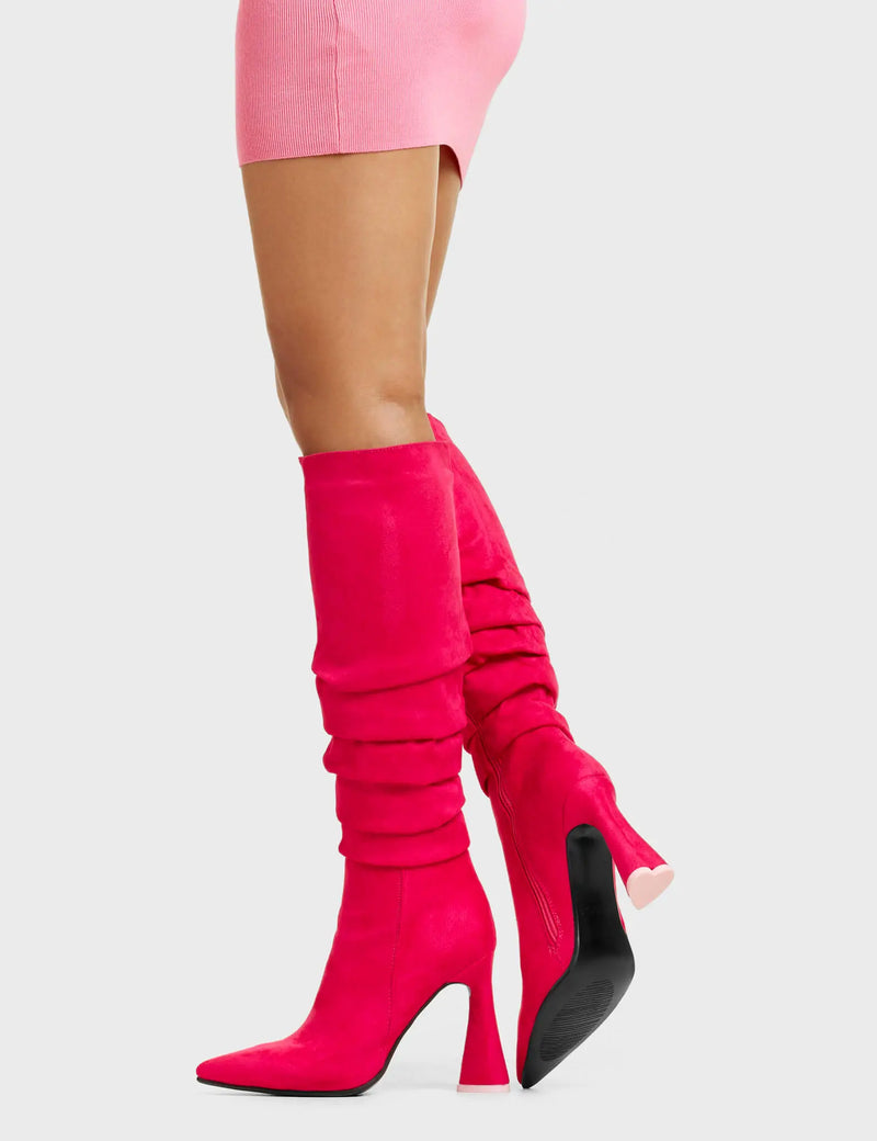 NO BURDEN
  
  Atomic Platform Knee High Boots in Fuchsia faux suede leather. These platform boots feature a chic look with layered upper and a heart shaped heel that also has a pink heart at the bottom, keeping it nice and classy. Made with eco-friendly materials and 100% cruelty-free, these platform boots are as ethical as they are chic.
  
  - Platform Height
  - Knee High length
  - Layered Upper
  - Heart Shaped Heel
  - Heart Detail
  - 100% vegan
  
  SKU: LMF 4823 - FuchsiaSUEDE