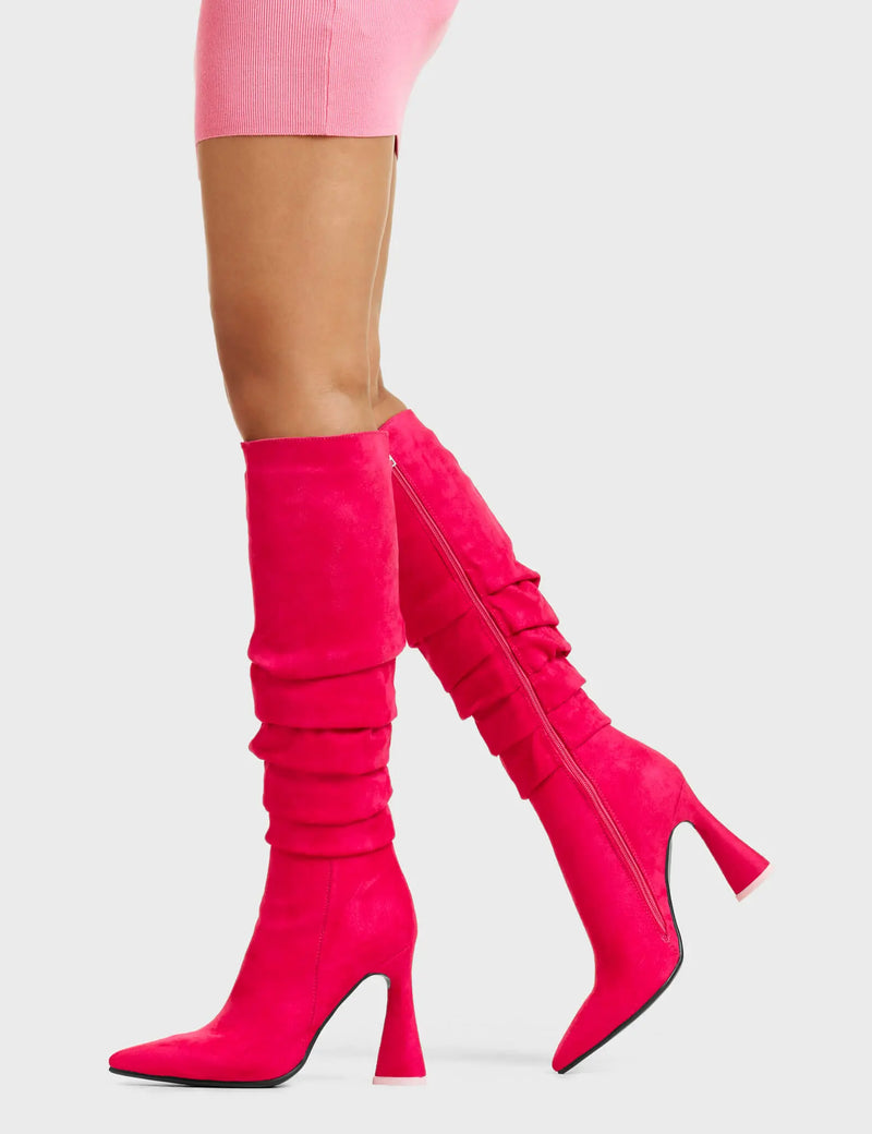NO BURDEN
  
  Atomic Platform Knee High Boots in Fuchsia faux suede leather. These platform boots feature a chic look with layered upper and a heart shaped heel that also has a pink heart at the bottom, keeping it nice and classy. Made with eco-friendly materials and 100% cruelty-free, these platform boots are as ethical as they are chic.
  
  - Platform Height
  - Knee High length
  - Layered Upper
  - Heart Shaped Heel
  - Heart Detail
  - 100% vegan
  
  SKU: LMF 4823 - FuchsiaSUEDE