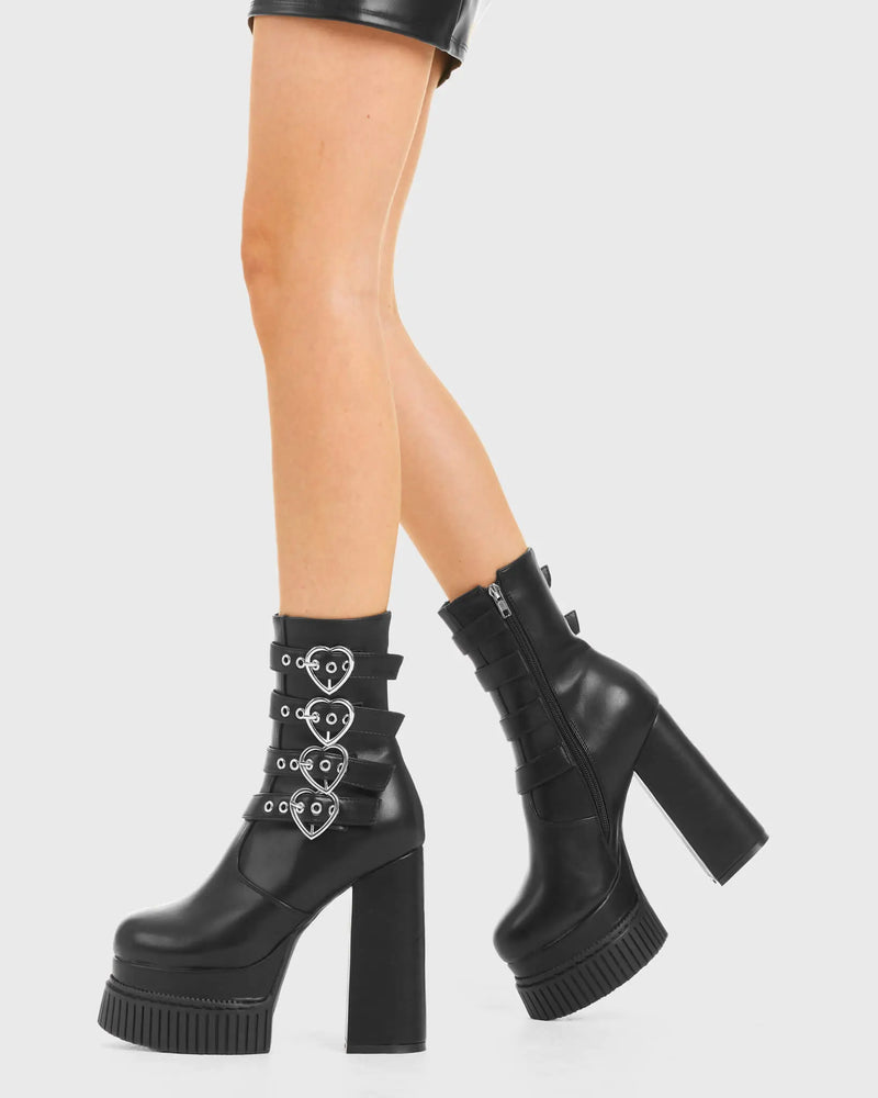 HEARTFELT
  
  Back To Love Creeper Platform Ankle Boots in Black faux leather. These vegan western Boots feature four adjustable straps and sliver heart buckles. Made with eco-friendly materials and 100% cruelty-free, these boots are as ethical as they are flirty!
  
  
  - Heel Height 
  - Calf length
  - Four adjustable straps 
  - Silver heart buckles
  - Rubber grip sole
  - Rounded toe 
  - 100% vegan 
  
  SKU: LMF 3965 - BlackPU