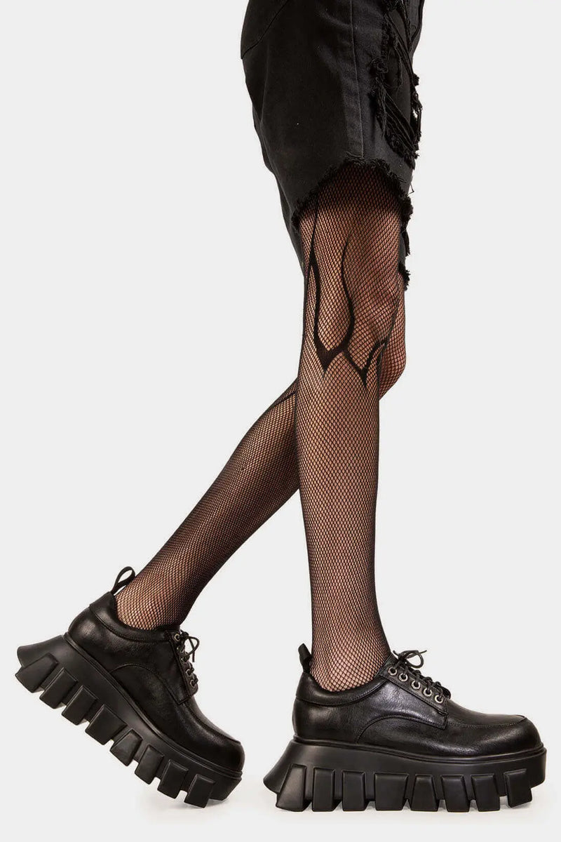 Edgy Explorers
  
  Black Hole Chunky Platform Sneakers in Black faux leather. These Black vegan Platform sneakers feature our chunky sole, platform sneakers that speak volumes step by step. Made with eco-friendly materials and 100% cruelty-free, these Chunky Sneakers are as ethical as they are unmatched!
  
  
  - Platform Height: 1.6 inch
  - Black laces
  - Silver eyelets
  - Chunky sole
  - Round Toe
  - 100% vegan 
  
  SKU: LMF 1033 - BlackPU