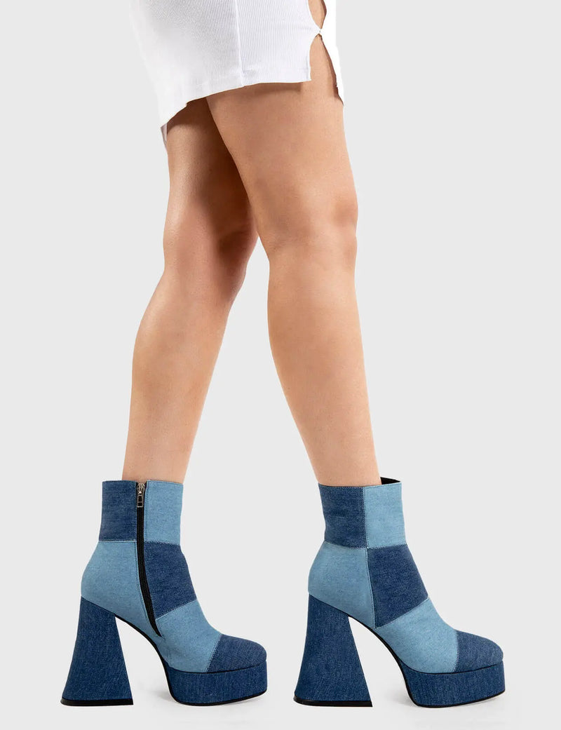 Denim Divas
  
  Break In Two Platform Ankle Boots in Denim. These platform boots feature our iconic patchwork denim finish on a platform sole, leave fashionable imprints with every step. Made with eco-friendly materials and 100% cruelty-free, these platform boots are as ethical as they are Trendy!
  
  - Platform Height
  - Heel Height
  - Black zipper
  - Denim
  - Mid ankle length
  - Platform sole
  - Round Toe 
  - 100% vegan 
  
  SKU: LMF 2626 - Denim
