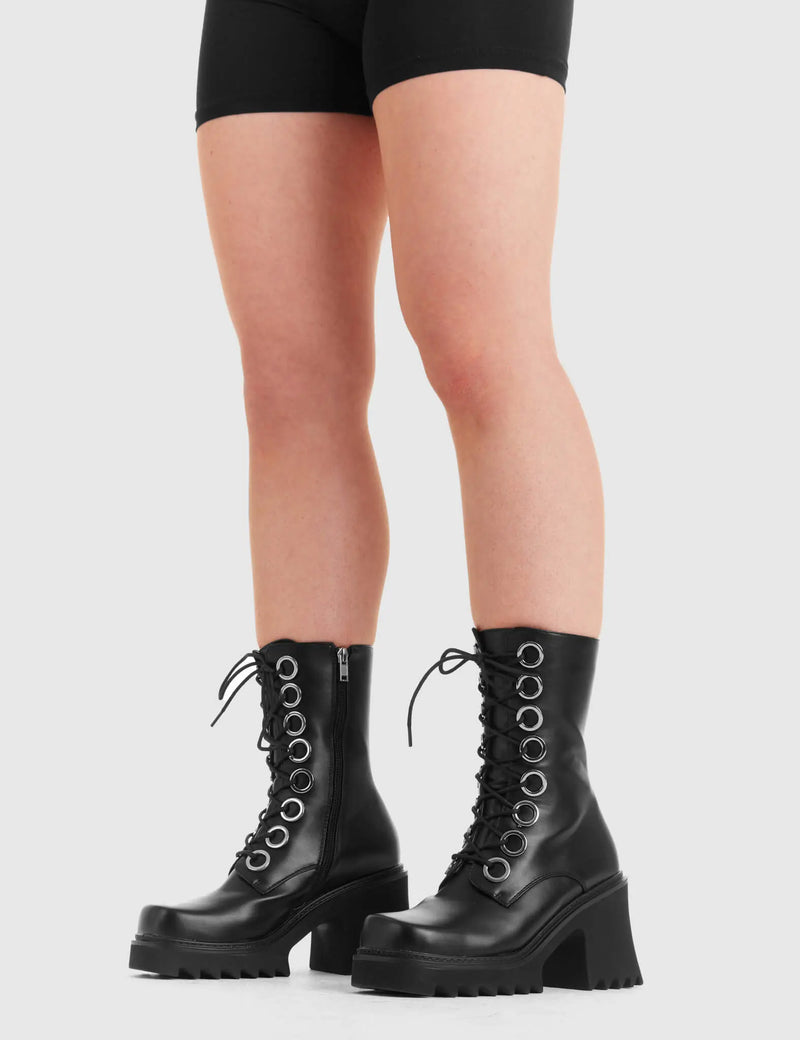LACED UP
  
  Bulletproof Chunky Platform Ankle Boots in Pink patent. These vegan western Boots feature black laces and a shark teeth grip sole, very chic. Made with eco-friendly materials and 100% cruelty-free, these boots are as ethical as they are edgy!
  
  
  - Chunky Platform
  - Calf length
  - Shark teeth grip
  - black laces
  - Silver eyelets
  - Rounded toe 
  - 100% vegan 
  
  SKU: LMF 3731 - PinkPAT