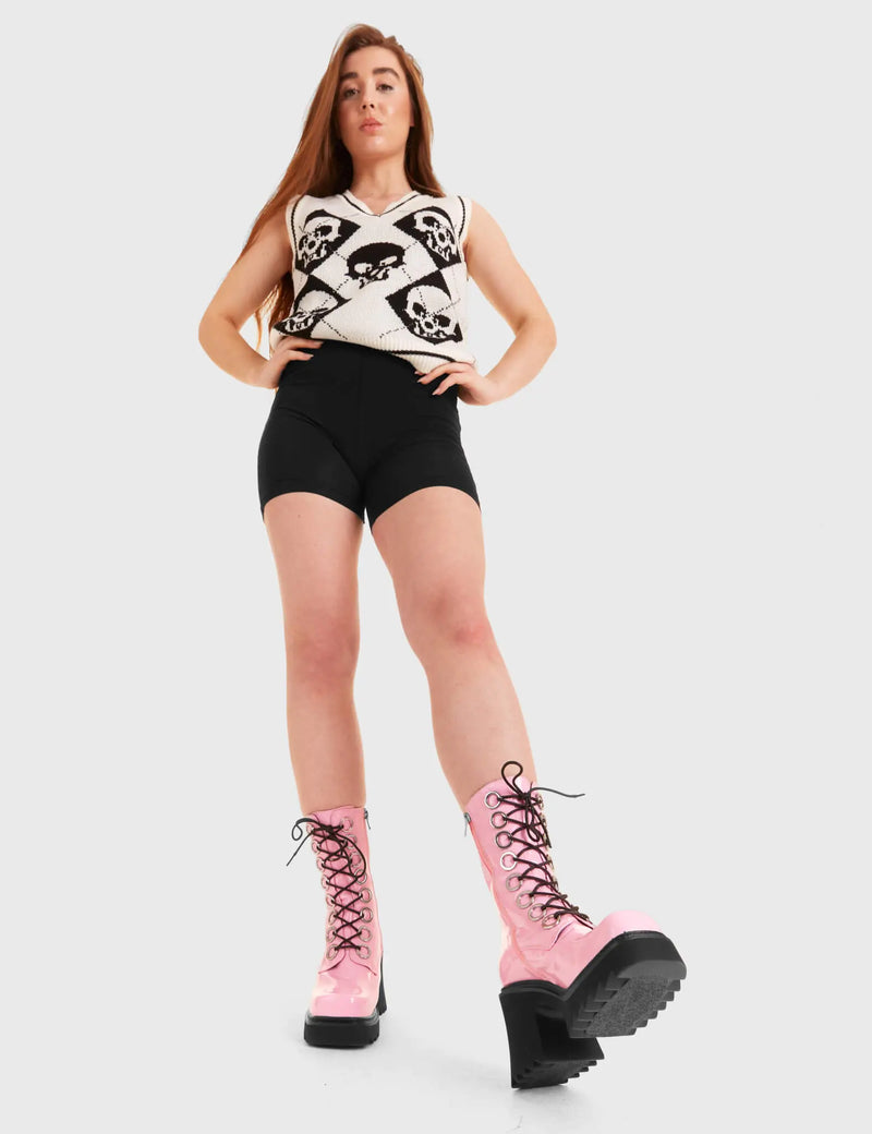 LACED UP
  
  Bulletproof Chunky Platform Ankle Boots in Pink patent. These vegan western Boots feature black laces and a shark teeth grip sole, very chic. Made with eco-friendly materials and 100% cruelty-free, these boots are as ethical as they are edgy!
  
  
  - Chunky Platform
  - Calf length
  - Shark teeth grip
  - black laces
  - Silver eyelets
  - Rounded toe 
  - 100% vegan 
  
  SKU: LMF 3731 - PinkPAT