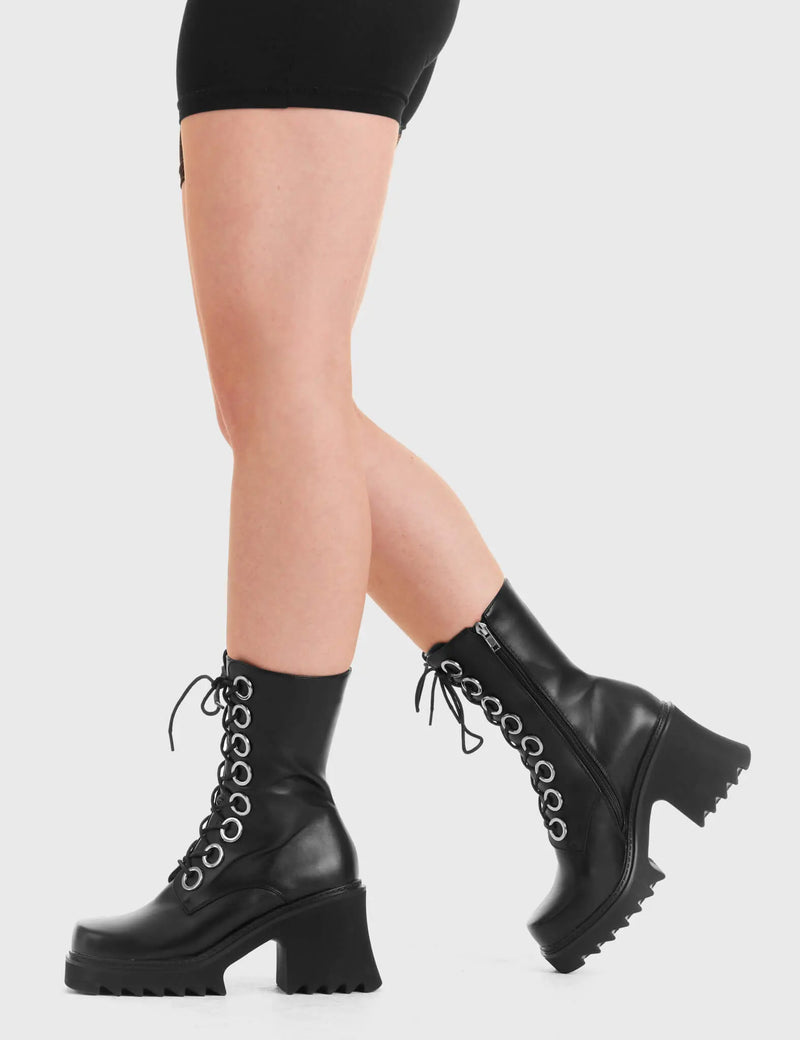 LACED UP
  
  Bulletproof Chunky Platform Ankle Boots in Pink patent. These vegan western Boots feature black laces and a shark teeth grip sole, very chic. Made with eco-friendly materials and 100% cruelty-free, these boots are as ethical as they are edgy!
  
  
  - Chunky Platform
  - Calf length
  - Shark teeth grip
  - black laces
  - Silver eyelets
  - Rounded toe 
  - 100% vegan 
  
  SKU: LMF 3731 - PinkPAT