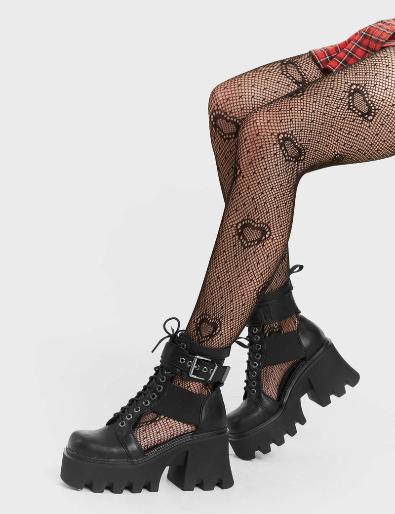 Vacation Vibes
  
  Busy Chunky Platform Ankle Boots in Black faux leather. These Black vegan Boots feature an adjustable lace up details with cut out detail on the side of the boot, relax in style and comfort. Made with eco-friendly materials and 100% cruelty-free.
  
  
  - Platform Height: 3.3 inch
  - Guseet detail
  - Wide ankle and calf friendly 
  - Black zipper
  - Black laces and silver eyelets 
  - Cut out detail
  - Chunky sole
  - Round Toe
  - 100% vegan 
  
  SKU: LMF 1245 - BlackPU