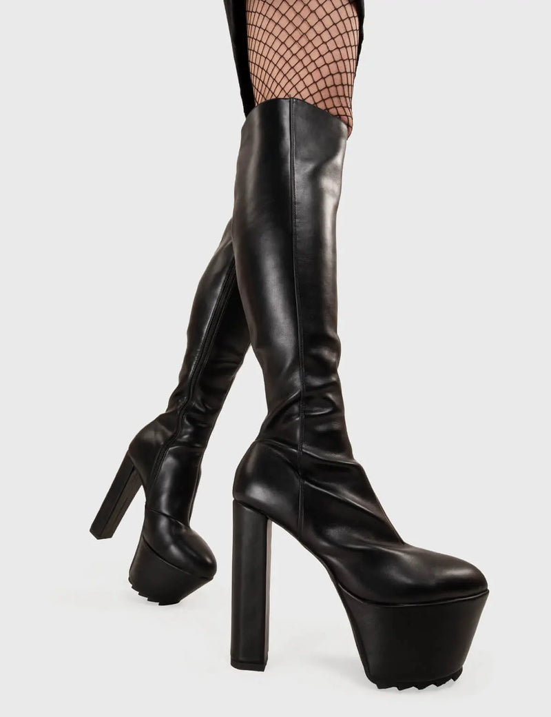 Not Your Basic Boots!
  
  Can't Stand You Platform Knee High Boots in Black faux leather. These platform boots feature a minimalist design with a pointed toe, on our platform sole and high heel. Made with eco-friendly materials and 100% cruelty-free, these platform boots are as ethical as they are eye-catching.
  
  - Platform Height
  - Heel Height
  - Black zip
  - Pointed toe
  - High Heel
  - Platform Sole
  - Shark's Teeth Grip
  - 100% vegan 
  
  SKU: LMF 3116 - BlackPU
