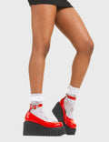 STRAPPED IN
  
  Cant Stop Chunky Platform Creeper Shoes in Red patent. These vegan western Boots feature a minimalist design with a silver heart buckle, very classy. Made with eco-friendly materials and 100% cruelty-free, these boots are as ethical as they are edgy!
  
  
  - Chunky Platform
  - Ankle length
  - Adjustable straps
  - Silver heart buckles
  - Rounded toe 
  - 100% vegan 
  
  SKU: LMF 3609 - RedPAT