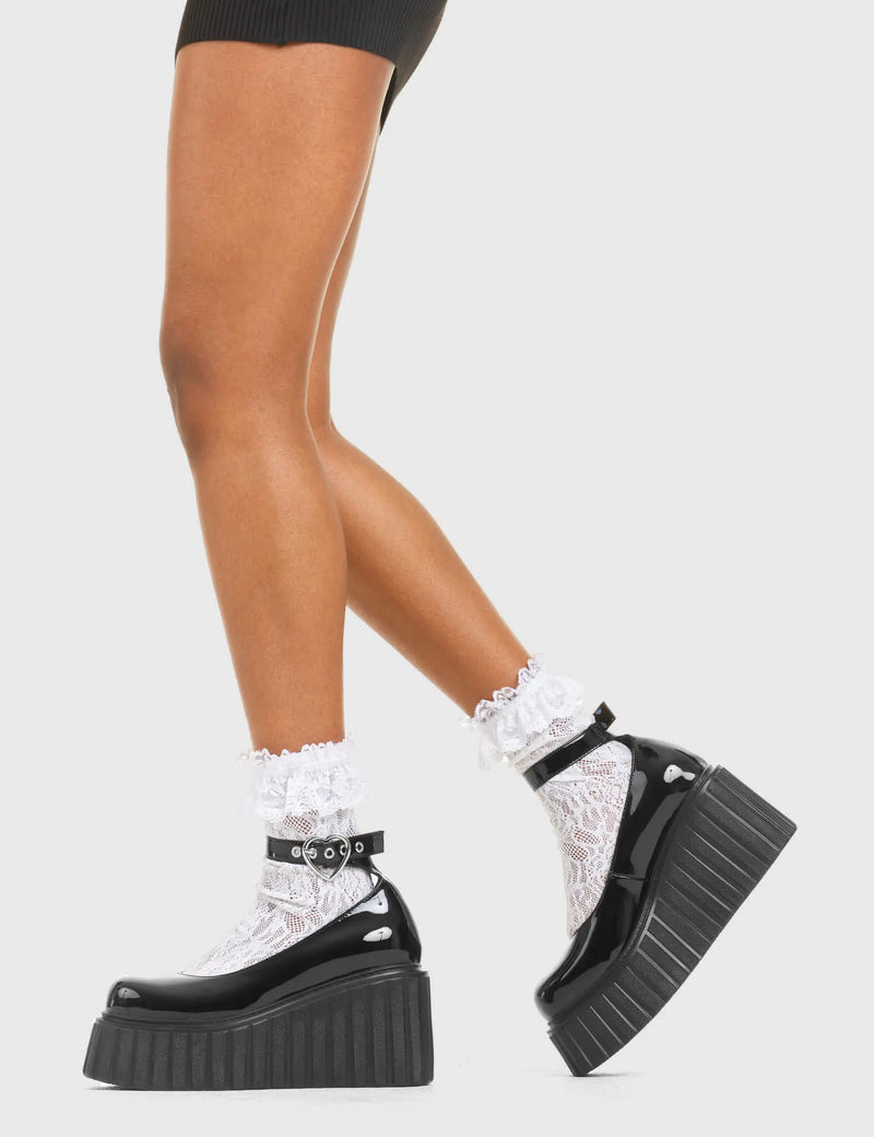 STRAPPED IN
  
  Cant Stop Chunky Platform Creeper Shoes in Black patent. These vegan western Boots feature a minimalist design with a silver heart buckle, very classy. Made with eco-friendly materials and 100% cruelty-free, these boots are as ethical as they are edgy!
  
  
  - Chunky Platform
  - Ankle length
  - Adjustable straps
  - Silver heart buckles
  - Rounded toe 
  - 100% vegan 
  
  SKU: LMF 3609 - BlackPAT