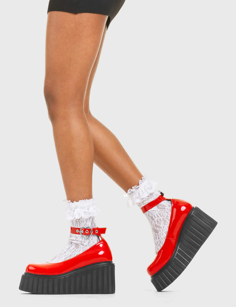 STRAPPED IN
  
  Cant Stop Chunky Platform Creeper Shoes in Red patent. These vegan western Boots feature a minimalist design with a silver heart buckle, very classy. Made with eco-friendly materials and 100% cruelty-free, these boots are as ethical as they are edgy!
  
  
  - Chunky Platform
  - Ankle length
  - Adjustable straps
  - Silver heart buckles
  - Rounded toe 
  - 100% vegan 
  
  SKU: LMF 3609 - RedPAT