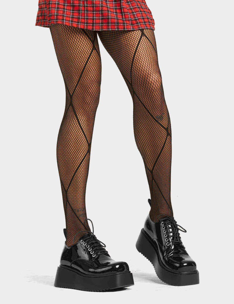 NO STOPPING
  
  Carry On Chunky Platform Shoesi n Black patent leather. These vegan shoes feature a lace up minimalist design and a bacl loop, very cute. Made with eco-friendly materials and 100% cruelty-free, these shoes are as ethical as they are chic!
  
  
  - Platform.
  - Lace up
  - Back loop
  - Chunky platform sole
  - Rounded toe
  - 100% vegan
  
  SKU: LMF 4008 - BlackPAT