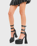 READY TO WEAR
  
  Complex Love Platform Calf Boots in Black faux leather. These platform boots feature three adjustable straps with heart shaped silver buckles and eyelets. Made with eco-friendly materials and 100% cruelty-free, these platform boots are as ethical as they are chic.
  
  - Platform Height
  - Three adjustable strap
  - Heart Shaped Silver buckles and Eyelets
  - Flared heel
  - Pointed toe
  - High Heel
  - 100% vegan 
  
  SKU: LMF 3530 - BlackPU