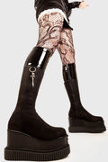 Sneaky Soles
  
  Devious Chunky Platform Knee High Boots in Black Faux leather. These black vegan Platform Boots feature two designer zips on the outter and towards the inner of the boot, leaving lasting impressions. Made with eco-friendly materials and 100% cruelty-free, these platform boots are as ethical as they are DEVIOUS!
  
  - Platform Height: 3 inch
  - Silver zipper 
  - Chunky platform sole
  - Round Toe
  - 100% vegan 
  
  SKU: LMF 1886 - BlackPU