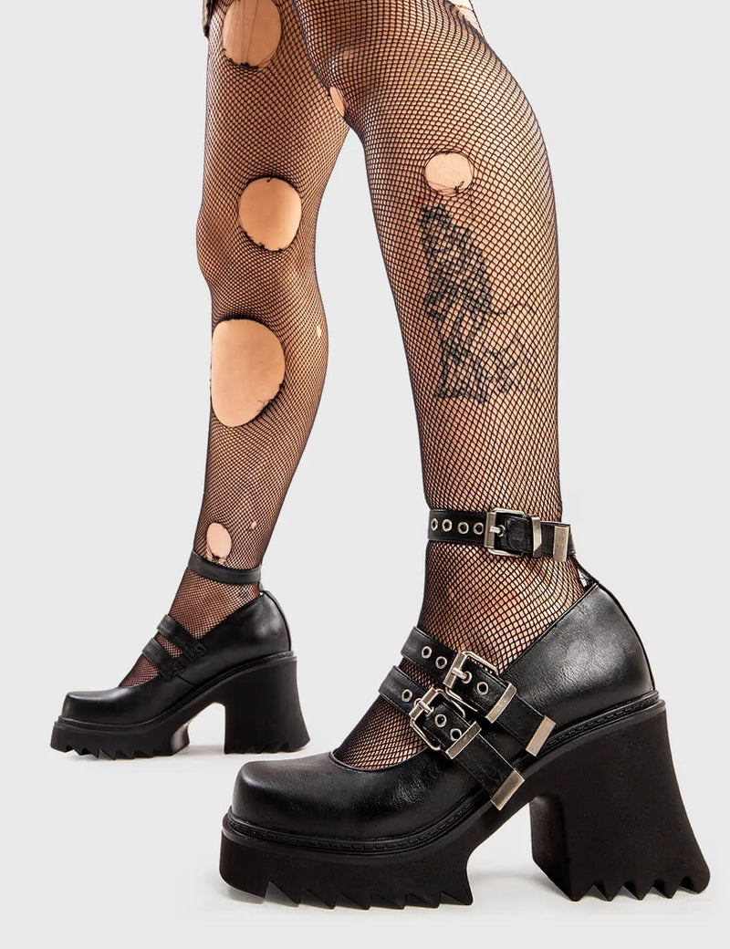 THE SHOEDROBE STAPLE
  
  Displaced Chunky Mary Jane Shoes in Black faux leather. These Mary Janes feature three adjustable straps with silvery eyelets and silver buckles, along with a Chunky and comfortable Platform sole. Everyone needs a pairs of Mary Janes! Made with eco-friendly materials and 100% cruelty-free
  
  - Platform Height:
  - three adjustable straps
  - Square buckles and silver eyelets
  - Chunky Platform sole
  - Round toe 
  - 100% vegan 
  
  SKU: LMF 2908 - BlackPU