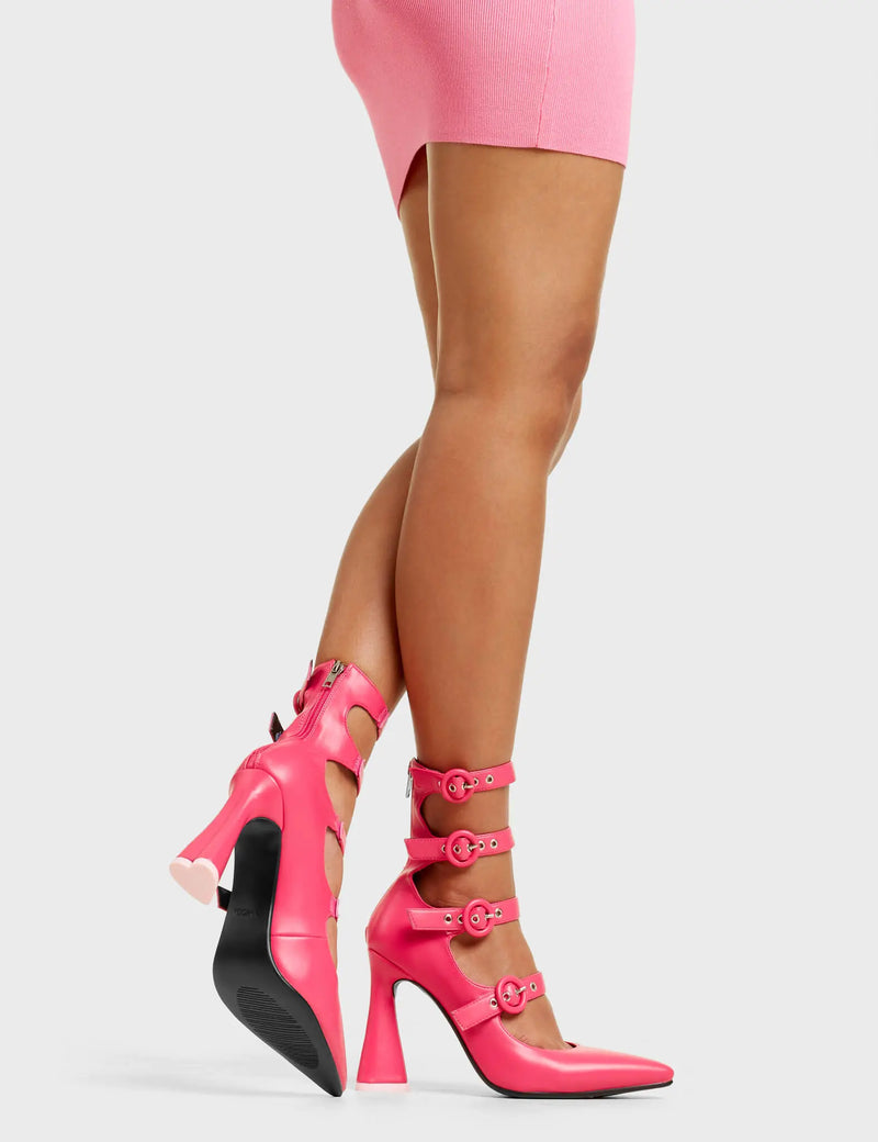 ALTER EGO
 
 Dollface Platform Heels in Fuchsia faux leather. These fuchsia platform heels feature our minimalist platform sole with an four adjustable straps and 'O' ring buckles with silver eyelets, also features a heart shaped heel with a pink heart at the bottom. Made with eco-friendly materials and is 100% vegan and cruelty-free.
 
 - Platform Height:
 - Heel Height:
 - Four Adjustable straps
 - Silver eyelets
 - 'O'ring buckles
 - Platform sole
 - Pointed Toe
 - 100% vegan
 
 SKU: LMF 4810 - FuchsiaPU