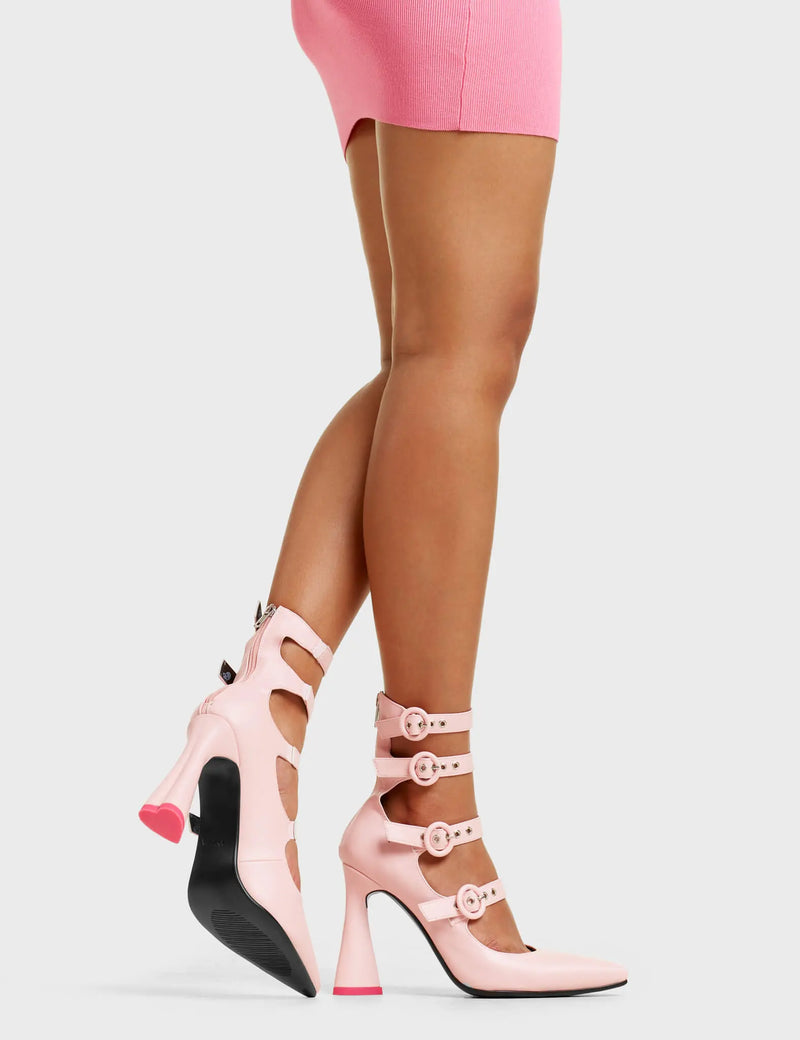ALTER EGO
 
 Dollface Platform Heels in Pink faux leather. These pink platform heels feature our minimalist platform sole with an four adjustable straps and 'O' ring buckles with silver eyelets, also features a heart shaped heel with a red heart at the bottom. Made with eco-friendly materials and is 100% vegan and cruelty-free.
 
 - Platform Height:
 - Heel Height:
 - Four Adjustable straps
 - Silver eyelets
 - 'O'ring buckles
 - Platform sole
 - Pointed Toe
 - 100% vegan
 
 SKU: LMF 4810 - PinkPU