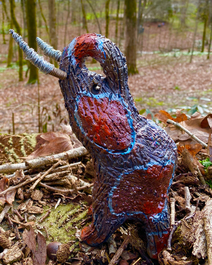 Have you HERD!!!!!!  Just one of these lovely Raku Fired Elephant will make an excellent gift for your  friend, sorority or for your home’ special place centerpiece.  9.5" x 4" x 7" 1.10 lbs Silver wire beaded tusk Beautiful metallic copper and orange raku colors For decorative purposely only.