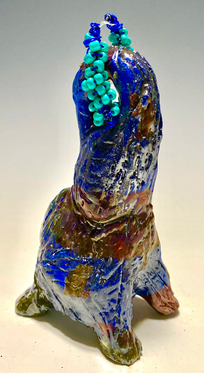 Raku Elephant Have you HERD!!!!!!  Just one of these lovely Raku Fired Elephant will make an excellent gift for your  friend, sorority or for your home’ special place centerpiece.   Beautiful copper blue rust raku elephant. 3.5" x 3" x 3" 12 ozs Beaded tribal tusk. For decorative purposely only