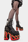 Blazing Trails
 
 Expensive Pain Chunky Platform Ankle Boot in Black faux leather. These black vegan Platform Boots feature a flame design on the sole and skull design on the outer with lace up detail, ignite your style and step into fire fashion. 
 
 
 - Platform Height
 - Heel Height 
 - Silver zipper
 - Flame design
 - Black laces with silver eyelets 
 - Silver spiked studs 
 - Adjustable black strap with silver eyelets
 - Square shaped buckles
 - Silver chain
 
 
 SKU: LMF 2051 - Black/Flame