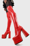 Ground Breaking
  
  Fantasies Platform Thigh High Boots in Red Stretch faux leather. These platform boots feature on our double stack platform sole, leave them with a lasting impression. Made with eco-friendly materials and 100% cruelty-free, these platform boots are as ethical as they are Ground Breaking!
  
  - Platform Height
  - Heel Height
  - Red Zip 
  - Thigh high length
  - Shark's teeth grip
  - Chunky Platform sole
  - Round Toe 
  - 100% vegan 
  
  SKU: LMF 2698 - RedPU