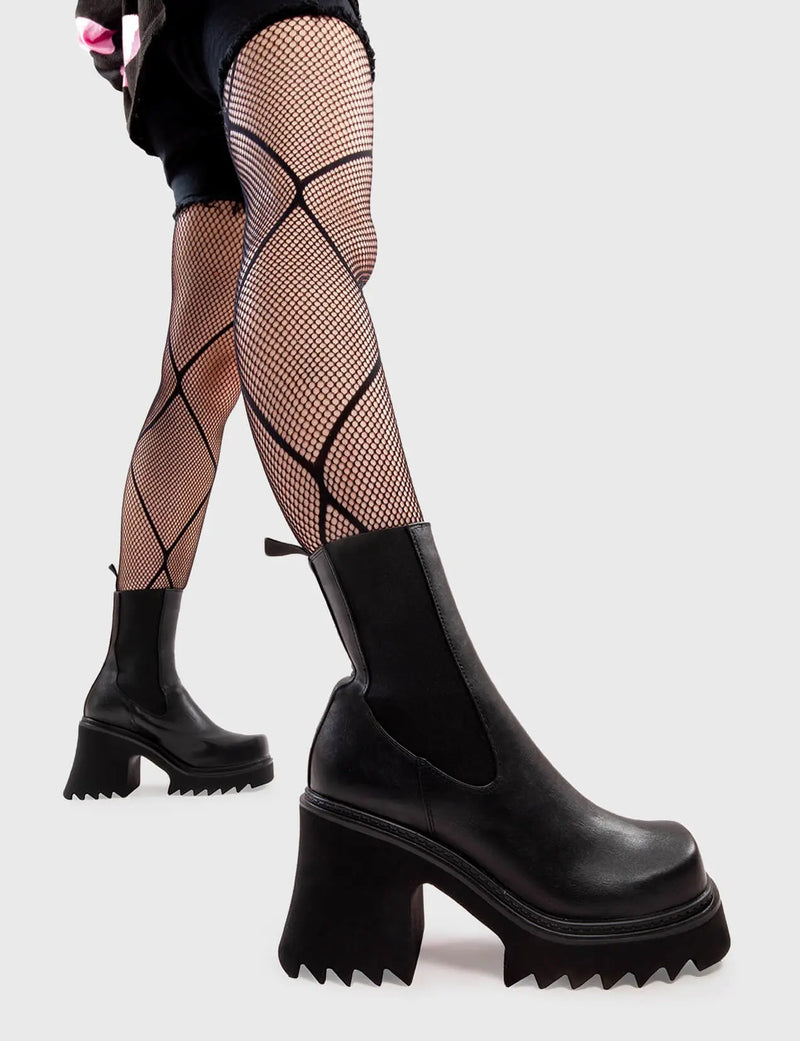Anything But Basic
  
  Fireflies Chunky Platform Ankle Boots in Black faux leather. These platform boots feature an elegant, minimalist design, with an elastic gusset and a chunky sole, the perfect way to elevate any outfit. Made with eco-friendly materials and 100% cruelty-free, these platform boots are as ethical as they are cool.
  
  - Platform Height
  - Heel Height 
  - Elastic gusset
  - Black Zip
  - Shark's teeth grip
  - Chunky Platform sole
  - 100% vegan 
  
  SKU: LMF 2911 - BlackPU