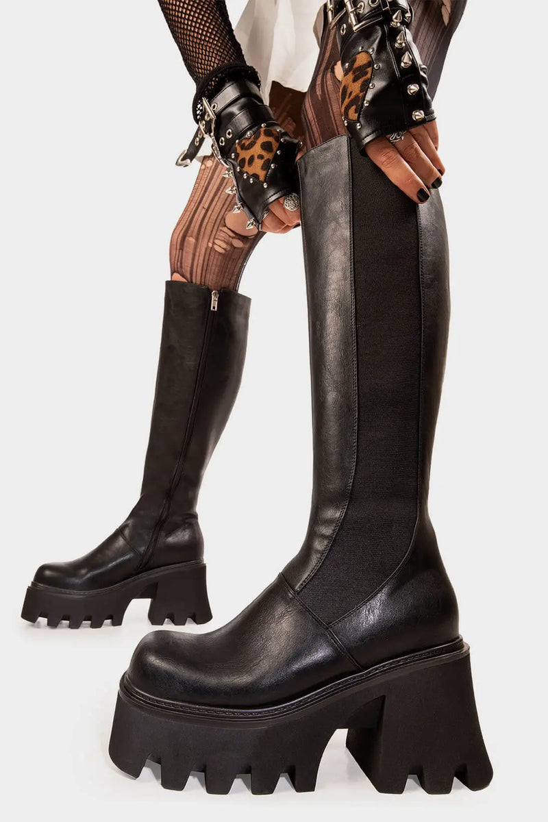 Punk Power
  
  For You Chunky Platform Knee High Boots in Black faux leather. These Black vegan Knee High Boots feature on a chunky platform sole with a stretchy gusset detail, elevate you style. Made with eco-friendly materials and 100% cruelty-free, these boots are as ethical as they are powerful!
  
  
  - Platform Height: 3.3 inch
  - Knee High length
  - Black zipper 
  - Chunky Platform sole
  - Gusset detail
  - Wide calf and ankle friendly
  - Round toe 
  - 100% vegan 
  
  SKU: LMF 1246 - BlackPU
