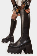 Punk Power
  
  For You Chunky Platform Knee High Boots in Black faux leather. These Black vegan Knee High Boots feature on a chunky platform sole with a stretchy gusset detail, elevate you style. Made with eco-friendly materials and 100% cruelty-free, these boots are as ethical as they are powerful!
  
  
  - Platform Height: 3.3 inch
  - Knee High length
  - Black zipper 
  - Chunky Platform sole
  - Gusset detail
  - Wide calf and ankle friendly
  - Round toe 
  - 100% vegan 
  
  SKU: LMF 1246 - BlackPU