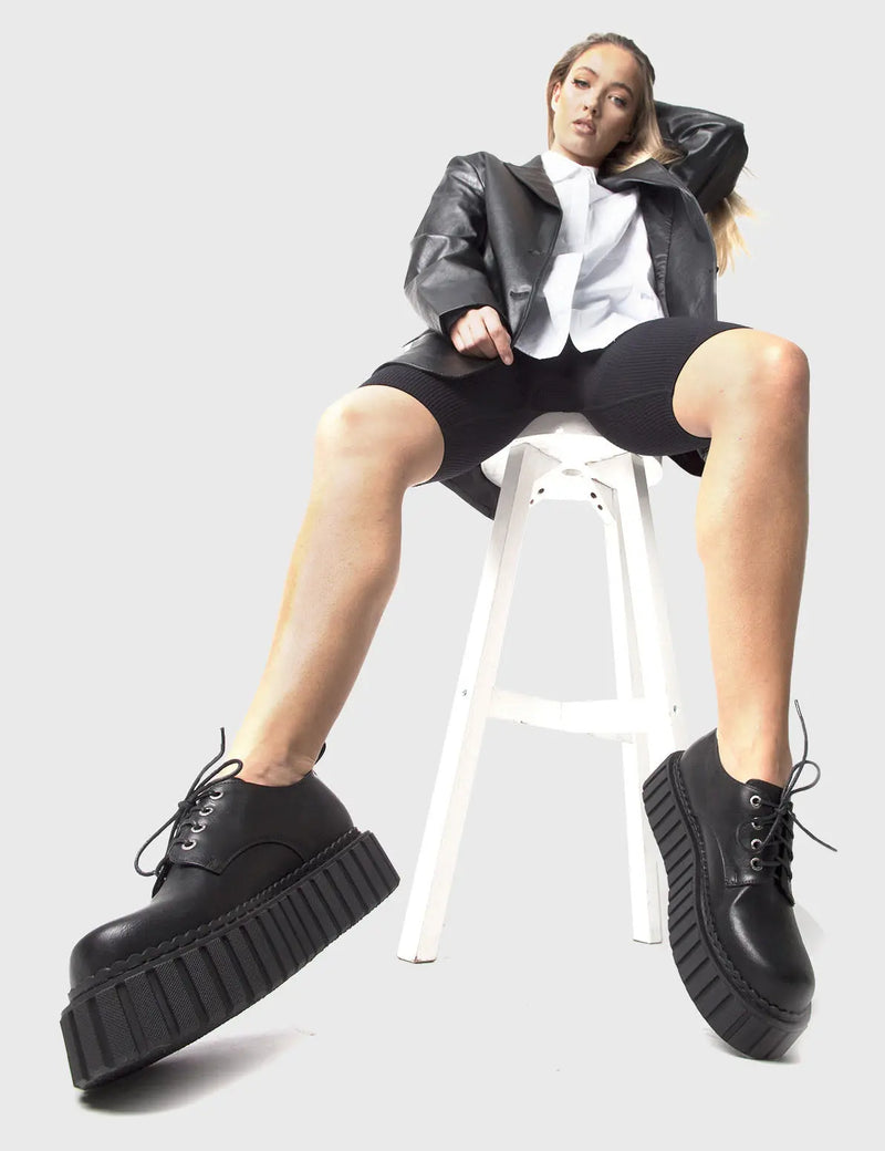 ANYTIME, ANYWHERE
  
  Freaky Creepy Chunky Creepers in Black faux leather. These classic creeprs feature a Chunky and comfortable Platform Creeper sole. Everyone needs a pairs of Creepers! Made with eco-friendly materials and 100% cruelty-free, these Creepers are as ethical as they are timeless!
  
  
  - Platform Height: 2.3 inch
  - Lace up
  - Chunky Platform Creeper sole
  - Round toe 
  - 100% vegan 
  
  SKU: LMF 861 - Black PU