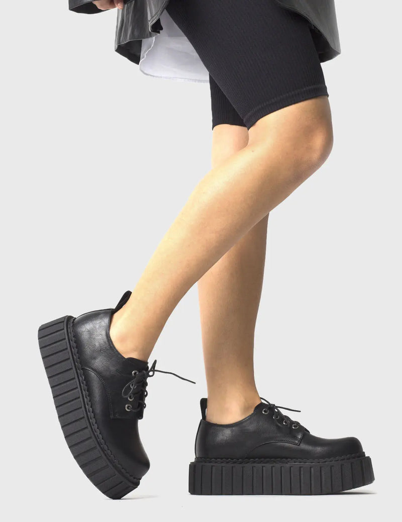 ANYTIME, ANYWHERE
  
  Freaky Creepy Chunky Creepers in Black faux leather. These classic creeprs feature a Chunky and comfortable Platform Creeper sole. Everyone needs a pairs of Creepers! Made with eco-friendly materials and 100% cruelty-free, these Creepers are as ethical as they are timeless!
  
  
  - Platform Height: 2.3 inch
  - Lace up
  - Chunky Platform Creeper sole
  - Round toe 
  - 100% vegan 
  
  SKU: LMF 861 - Black PU