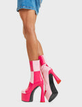 NEVER FOLD 
  
  Fuchsia City Platform Ankle Boots in Pink and Fuchsia faux leather. These platform boots featurex our patch work look design with a Heart shaped heel that included a red heart at the bottom, keeping it nice and classy. Made with eco-friendly materials and 100% cruelty-free, these platform boots are as ethical as they are chic.
  
  - Platform Height: 6 CM
  - Heel Height: 14 CM
  - Ankle length
  - Lace up
  - Heart heel
  - High Heel
  - 100% vegan
  
  SKU: LMF 4470 - PinkPU/FuchsiaPU