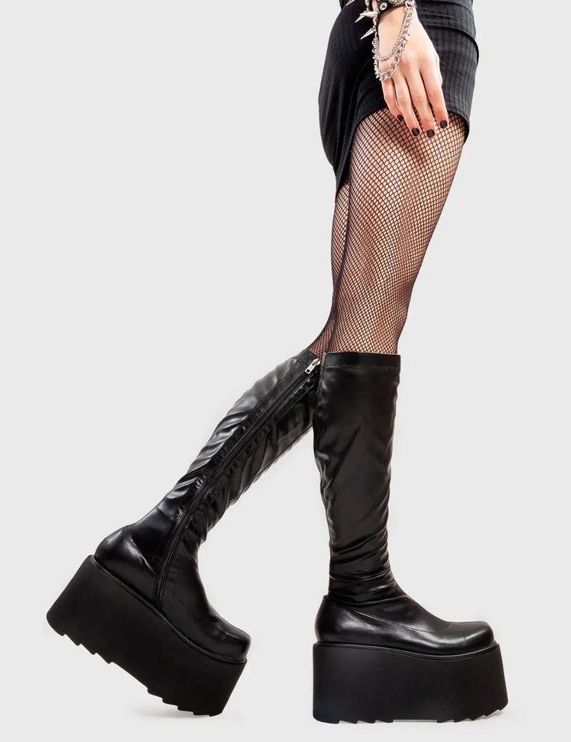 Step Out in Fashion
  
  FYI Chunky Platform Knee High Boots in Black faux leather. These flatform shoes feature a minimalist design, with a fitted feel. Made with eco-friendly materials and 100% cruelty-free, these platform boots are as ethical as they are Edgy
  
  - Platform Height
  - fitted feel
  - Flatform Sole
  - Shark's Teeth Grip
  - 100% vegan 
  
  SKU: LMF 3147 - BlackPU