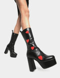 LOVE AT FIRST SIGHT

Game Of Love Platform Calf Boots in Black faux leather. These Black vegan Boots feature our ICONIC Red faux suede hearts and Platform sole and heel, perfect for adding height and style to any outfit. Made with eco-friendly materials and 100% cruelty-free, these boots are as ethical as they are cute!


- Platform Height: 1.25 inch
- Heel Height: 4.2 inch
- Calf High length
- Red Hearts
- Black zipper 
- Platform sole
- Round Toe
- 100% vegan 

SKU: LMF 1213 - BlackPU/RedHeart