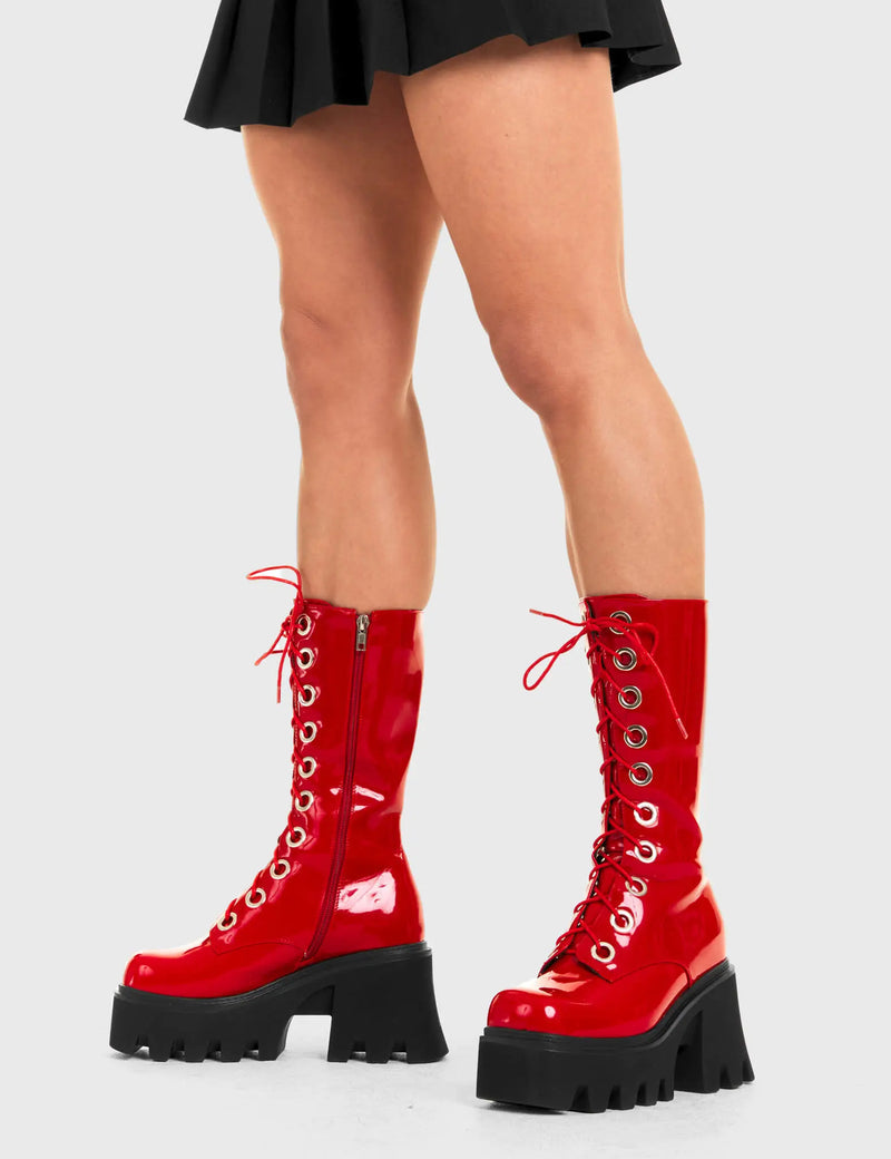 THESE BOOTS ARE MADE FOR WALKING
  
  Get Paid Chunky Platform Calf Boots in Red patent. These vegan western Boots feature a black lace up boot with silver round eyelets , very classy. Made with eco-friendly materials and 100% cruelty-free, these boots are as ethical as they are edgy!
  
  
  - Chunky Platform
  - Calf length
  - Lace up
  - Silver round eyelets
  - Rounded toe 
  - 100% vegan 
  
  SKU: LMF 3605 - RedPAT