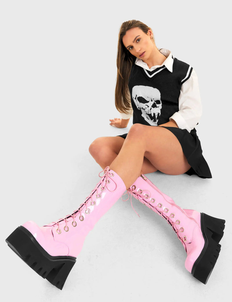 THESE BOOTS ARE MADE FOR WALKING
  
  Get Paid Chunky Platform Calf Boots in Pink patent. These vegan western Boots feature a pink lace up boot with silver round eyelets , very classy. Made with eco-friendly materials and 100% cruelty-free, these boots are as ethical as they are edgy!
  
  
  - Chunky Platform
  - Calf length
  - Lace up
  - Silver round eyelets
  - Rounded toe 
  - 100% vegan 
  
  SKU: LMF 3605 - PinkPAT
