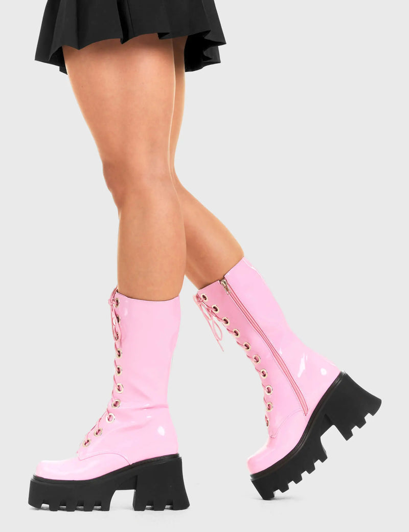 THESE BOOTS ARE MADE FOR WALKING
  
  Get Paid Chunky Platform Calf Boots in Pink patent. These vegan western Boots feature a pink lace up boot with silver round eyelets , very classy. Made with eco-friendly materials and 100% cruelty-free, these boots are as ethical as they are edgy!
  
  
  - Chunky Platform
  - Calf length
  - Lace up
  - Silver round eyelets
  - Rounded toe 
  - 100% vegan 
  
  SKU: LMF 3605 - PinkPAT