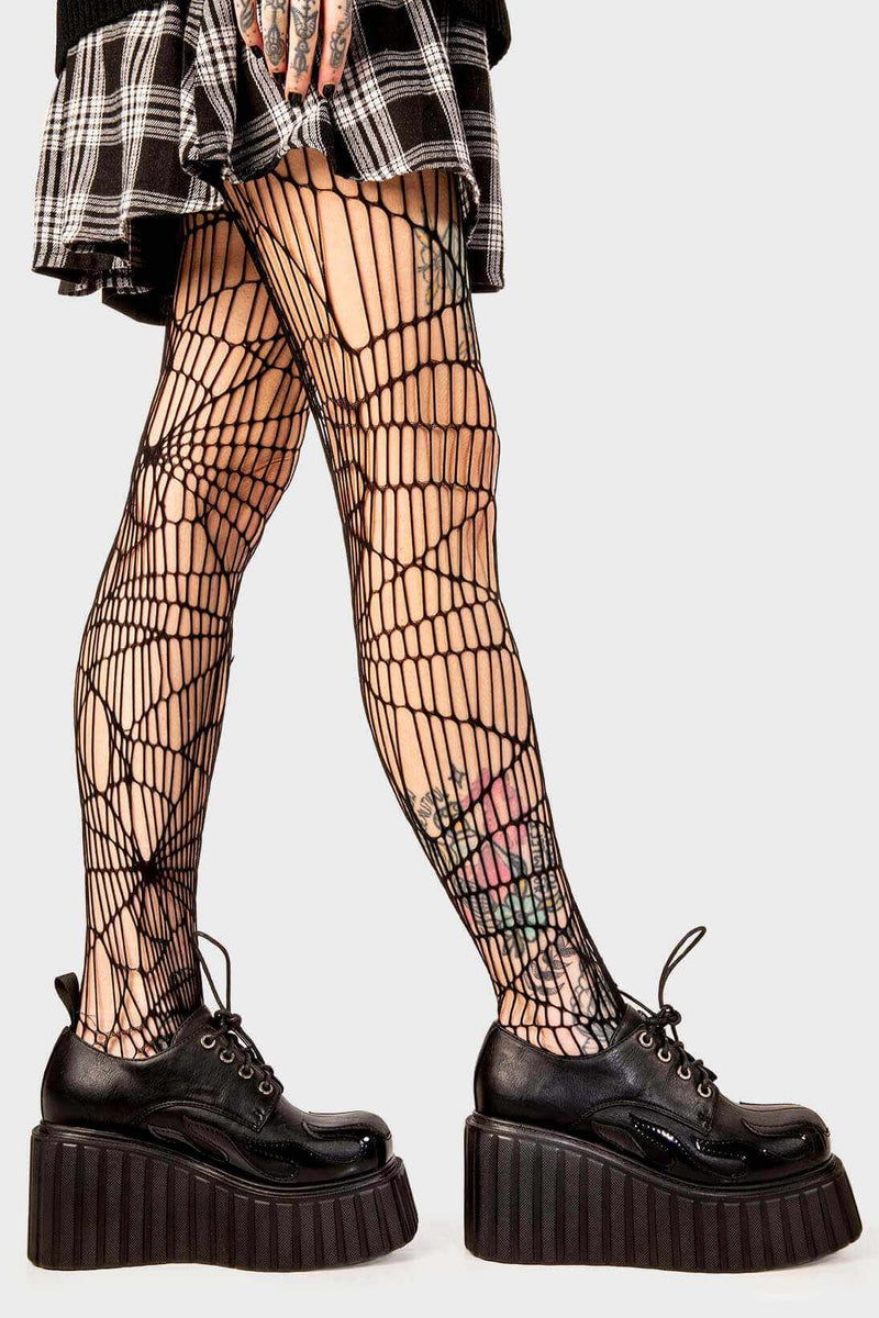 Blaze Runner
  
  Girls On Tour Chunky Platform Creeper Shoes in Black. These black creeper shoes feature a patent black flame across the side of the shoe, stepping on flames and setting hot trends. Made with eco-friendly materials and 100% cruelty-free, these platform boots are as ethical as they are HOT!
  
  - Platform Height
  - Black Laces with black eyelets
  - Patent black flame 
  - Chunky creeper wedge sole
  - Round Toe 
  - 100% vegan 
  
  SKU: LMF 2222 - Black/Flame