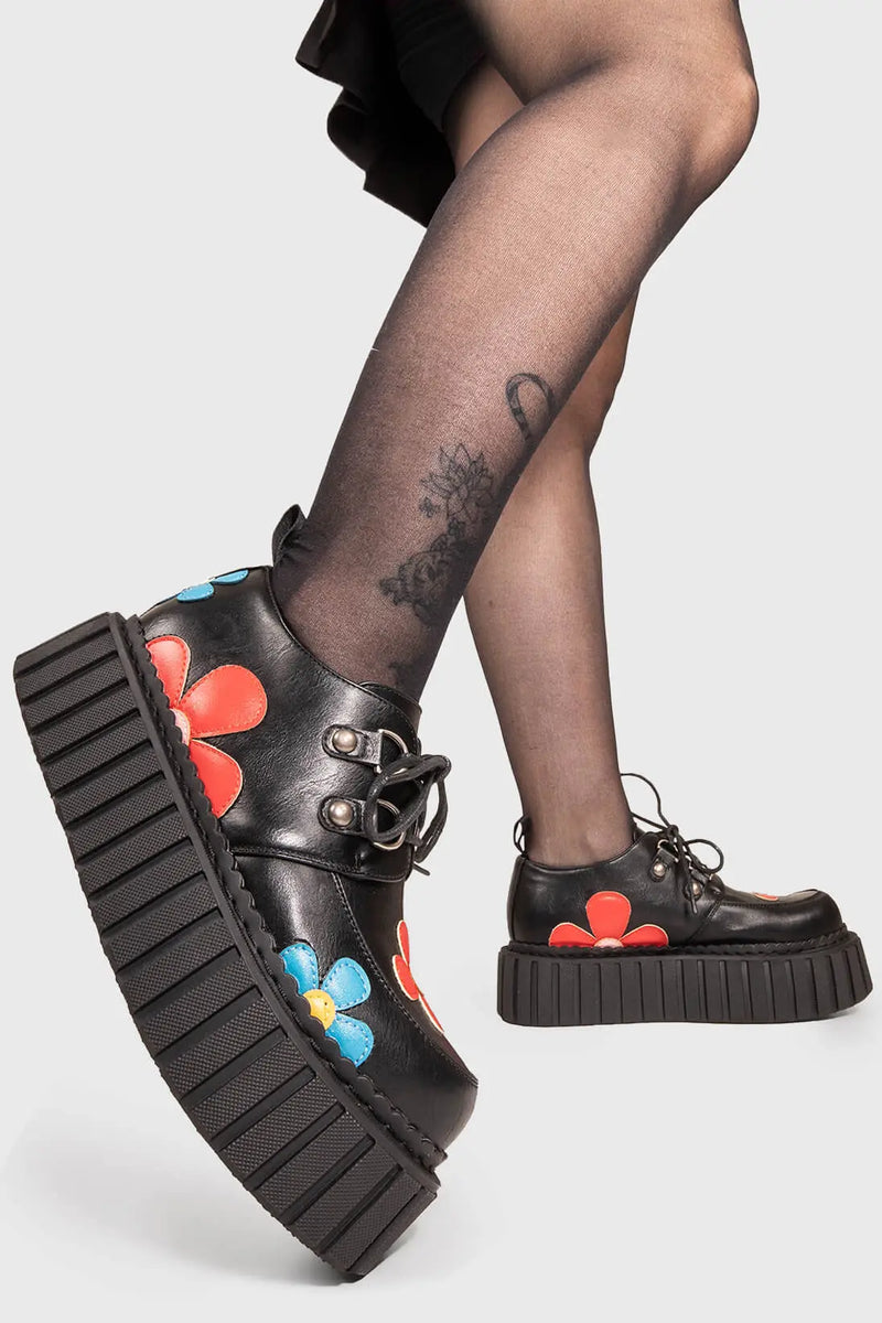Blooming Beauties
  
  Give A little Chunky Creeper Shoes in Black faux leather. These Black vegan creeper shoes feature Red and Blue flowers throughout on our chunky sole empowering your blooming beauty. Made with eco-friendly materials and 100% cruelty-free, these creeper shoes are as ethical as they are beautiful!
  
  
  - Platform Height: 2.3 inch
  - Black laces 
  - Silver eyelets
  - Red and Blue Flowers
  - Chunky Creeper sole
  - Round Toe
  - 100% vegan 
  
  SKU: LMF 1588 - BlackPU/MultiFlower