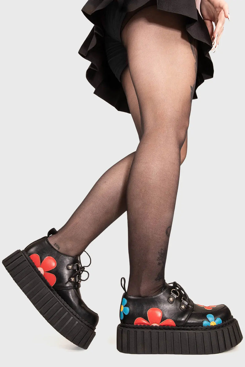 Blooming Beauties
  
  Give A little Chunky Creeper Shoes in Black faux leather. These Black vegan creeper shoes feature Red and Blue flowers throughout on our chunky sole empowering your blooming beauty. Made with eco-friendly materials and 100% cruelty-free, these creeper shoes are as ethical as they are beautiful!
  
  
  - Platform Height: 2.3 inch
  - Black laces 
  - Silver eyelets
  - Red and Blue Flowers
  - Chunky Creeper sole
  - Round Toe
  - 100% vegan 
  
  SKU: LMF 1588 - BlackPU/MultiFlower