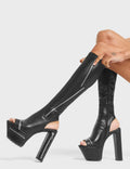 VIGILANTE
 
 Give It Up Platform Knee High Boots in Black faux leather. These boots feature an edgy zip design around and across the boot, with a block heel that also features a zip design. Also features a open toe and heel aesthetic. On our platform sole, the perfect way to make everyone stop and stare. Made with 100% vegan materials 
 
 - Platform Height: 5.5 CM
 - Heel Height: 14 CM
 - Silver Zip design
 - High Heel
 - Cut out design
 - Platform sole
 - Open toe.
 - 100% vegan
 
 SKU: LMF 4426 - BlackPU