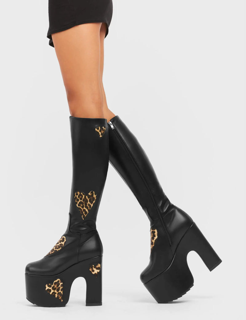 DELICATE LOVER
  
  Glass Heart Chunky Platform Knee High Boots in Black and leopard faux leather. These vegan boots feature faux suede leopard print hearts and a Chunky Platform sole, perfect for adding height and the wow factor to any outfit. Made with eco-friendly materials and 100% cruelty-free!
  
  - Platform Height: 
  - Heel Height:
  - Knee high length
  - Leopard print hearts
  - Black Zipper
  - Chunky Platform Sole
  - Round Toe
  - 100% Vegan
  
  SKU: LMF 5114 - BlackPU/Leo
