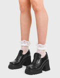 FLOWER GIRL Good Evening Chunky Mary Jane Shoes, in Black Faux Leather. These vegan western Boots feature a brogued silhouette and a shark teeth grip sole, very classy. Made with eco-friendly materials and 100% cruelty-free, these boots are as ethical as they are edgy! - Chunky Platform - Ankle length - Shark teeth grip - Brogued - Rounded toe - 100% vegan SKU: LMF 3727 - BlackPU